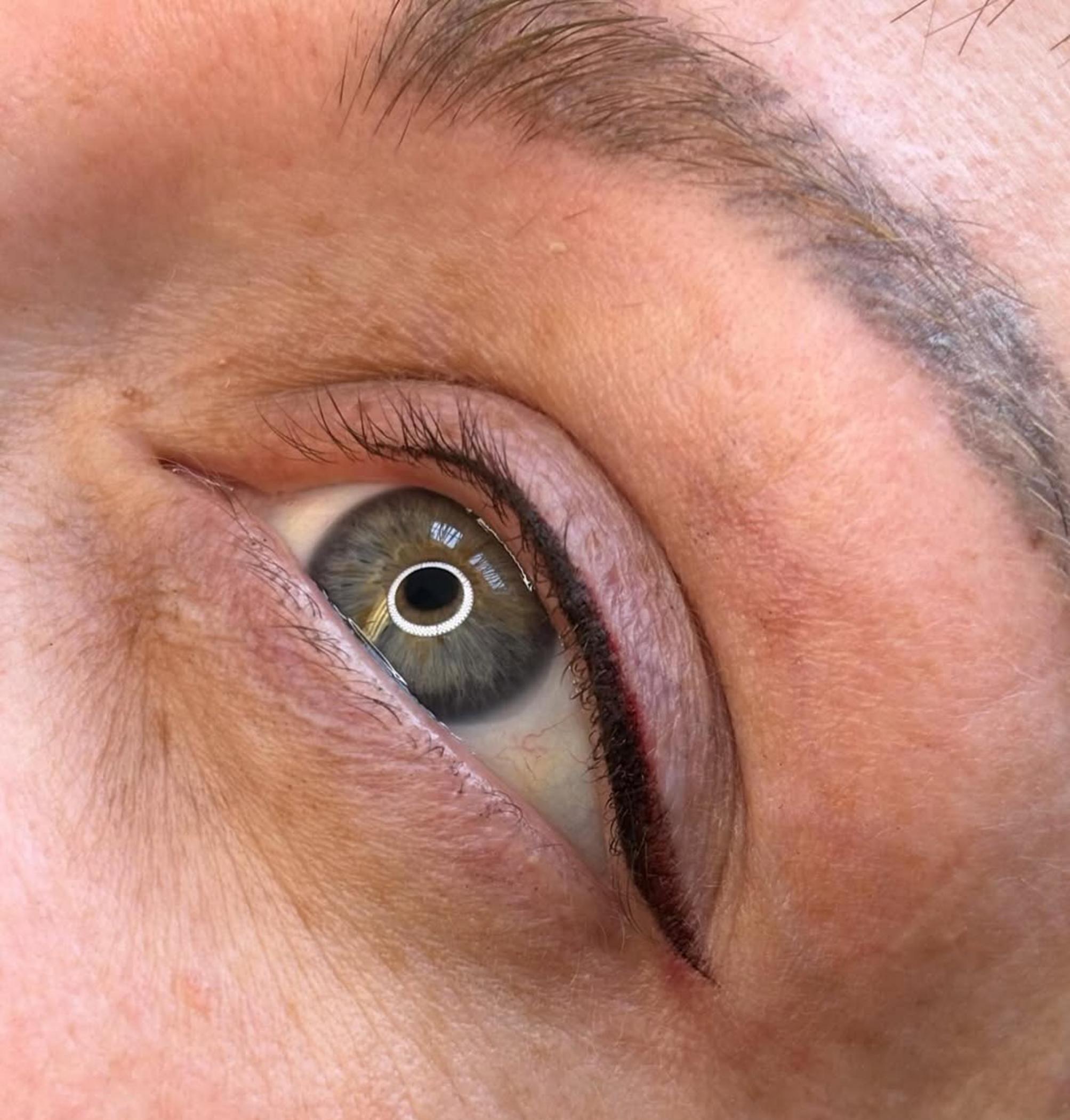 close up eyeliner tattoo pigment detail