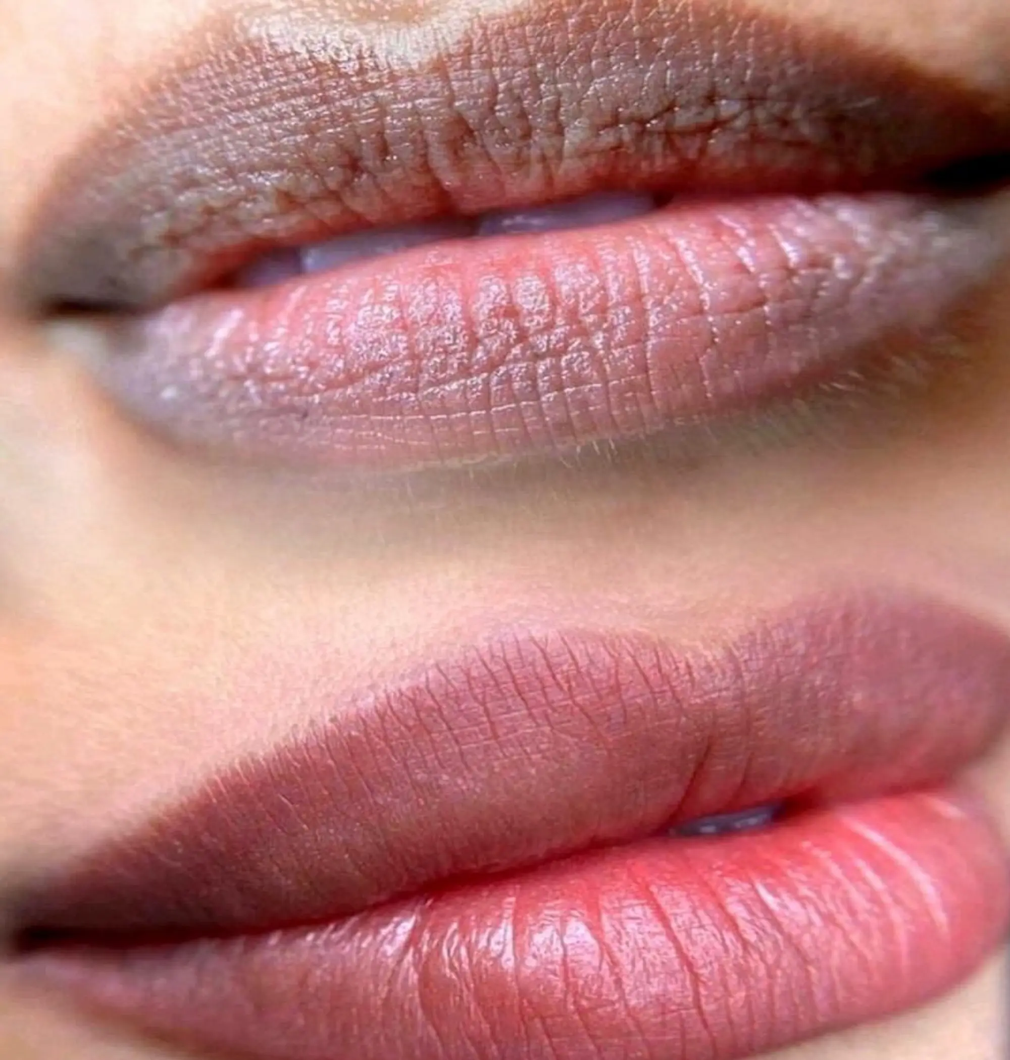 technician performing lip pigment application